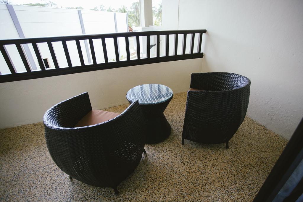 Sand & Sandals Desaru Beach Resort & Spa Eksteriør billede A set of outdoor furniture